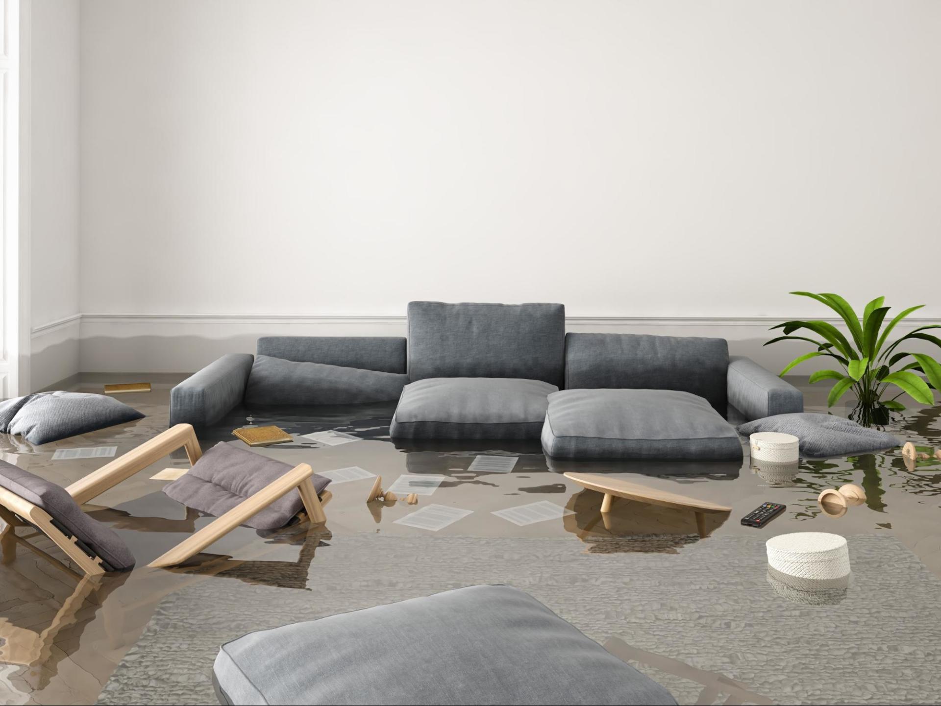 A flooded house filled with furniture and water